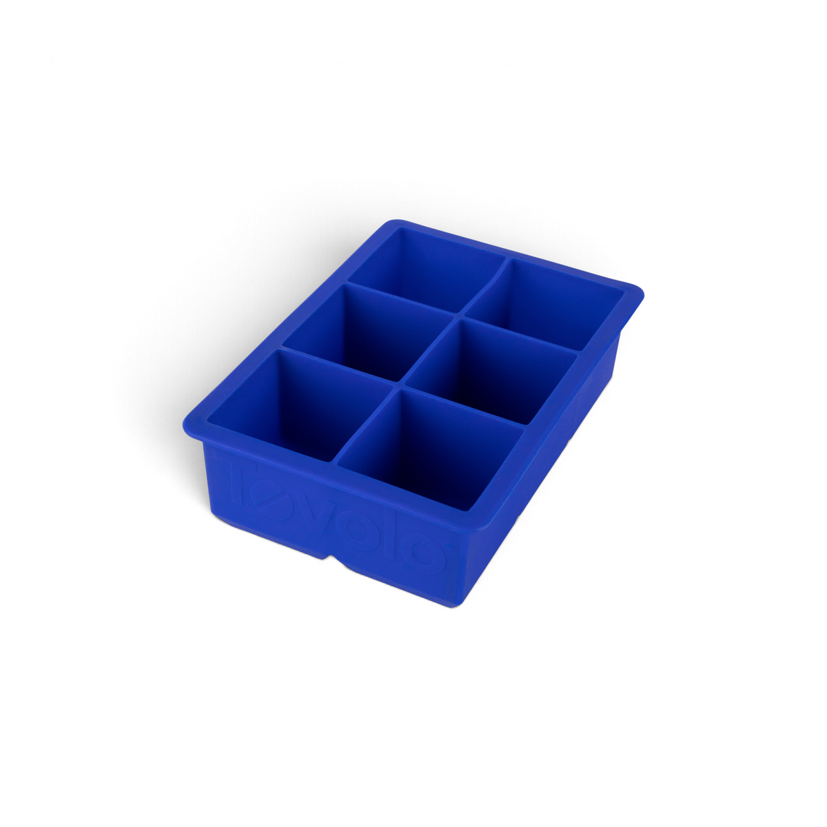 The tovolo King Cube Silicone Ice Mold features six large square compartments, making it perfect for crafting big ice cubes.