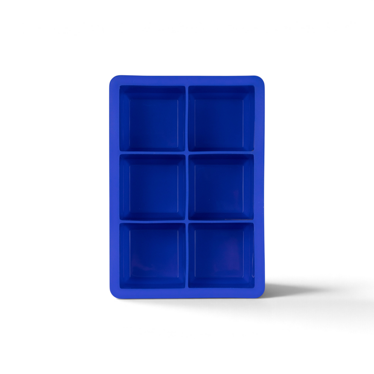 The tovolo King Cube Silicone Ice Mold features six large square compartments, ideal for making big ice cubes. The blue tray is shown from above on a white background.