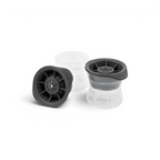 Two clear plastic and black silicone Sphere Ice Molds by tovolo are upright, showing the brand logo; a third mold is tilted, displaying its inner spokes for crafting slow-melting ice cubes. Set includes 2 molds.