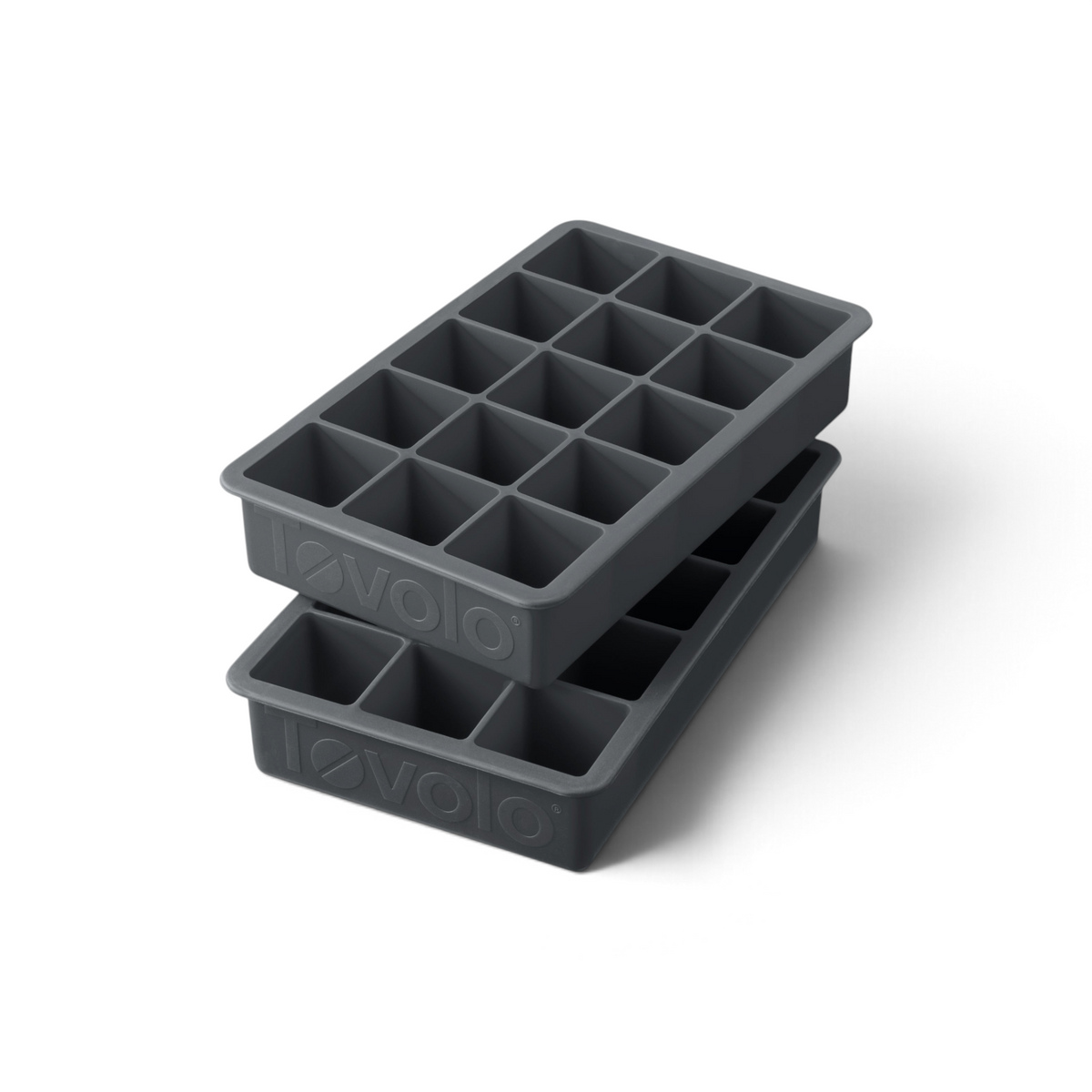 The tovolo Perfect Cube Silicone Ice Molds (Set of 2) are black, food-grade trays, each with fifteen square compartments for making long-lasting ice cubes.