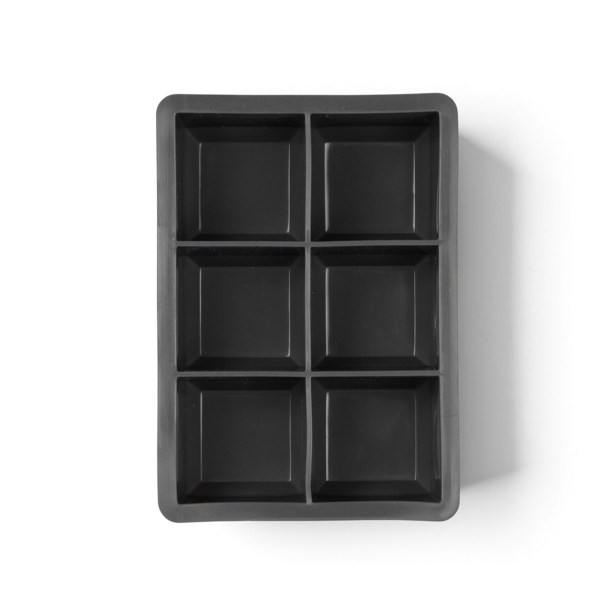 The tovolo King Cube Silicone Ice Mold, shown from above on a white background, features six square cavities in a black tray—perfect for making large ice cubes.