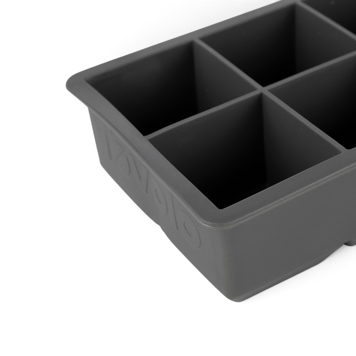 Close-up of the tovolo King Cube Silicone Ice Mold, featuring six large square compartments for making big ice cubes, shown at an angle.