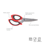 Tovolo Kitchen Shears feature red and black ergonomic handles, micro-serrated blades, a built-in bottle opener, and labeled blades that separate for easy cleaning. BPA-free, food-safe, and dishwasher-safe.