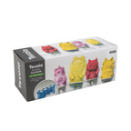 A box of Pop Molds includes colorful popsicle molds shaped like playful monsters in yellow, red, and purple—ideal for homemade frozen treats, with images of the pops displayed on the packaging.