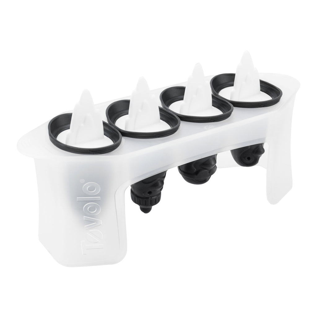The Penguin Pop Molds is a white plastic tray with four slots, each featuring a black and white handle shaped like a penguin fin. Slim and perfect for homemade frozen treats, it has the Tovolo name embossed on the side.