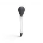 The Bulb Baster, featuring a clear plastic tube and a heat-resistant silicone bulb, is shown from above on a white background.