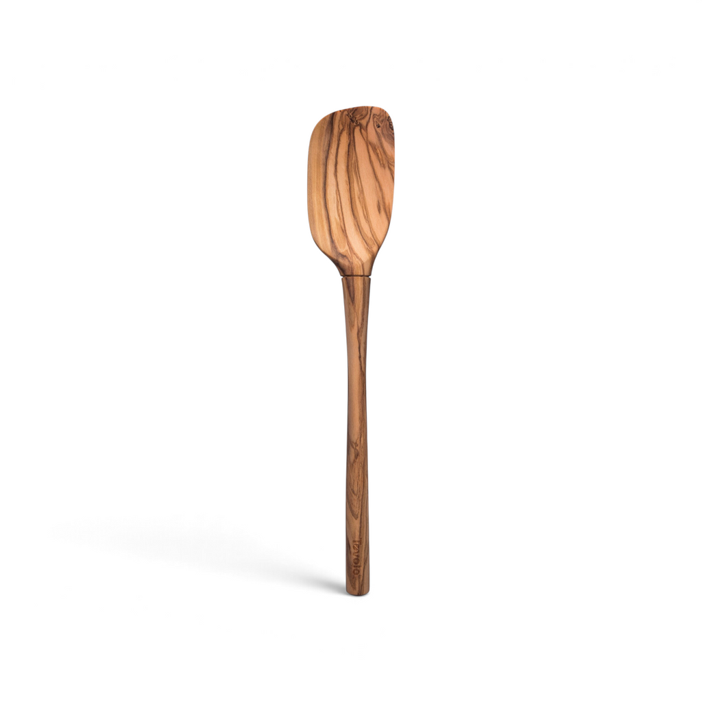 The tovolo Olivewood Spoonula features a smooth, polished finish and distinct wood grain patterns. Designed to be nonstick safe, it is displayed against a white background.