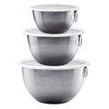 The tovolo Stainless Steel Mixing Bowl Set includes three stackable bowls of varying sizes, each with a white lid and a side metal ring. This durable set is ideal for all your kitchen prep needs.