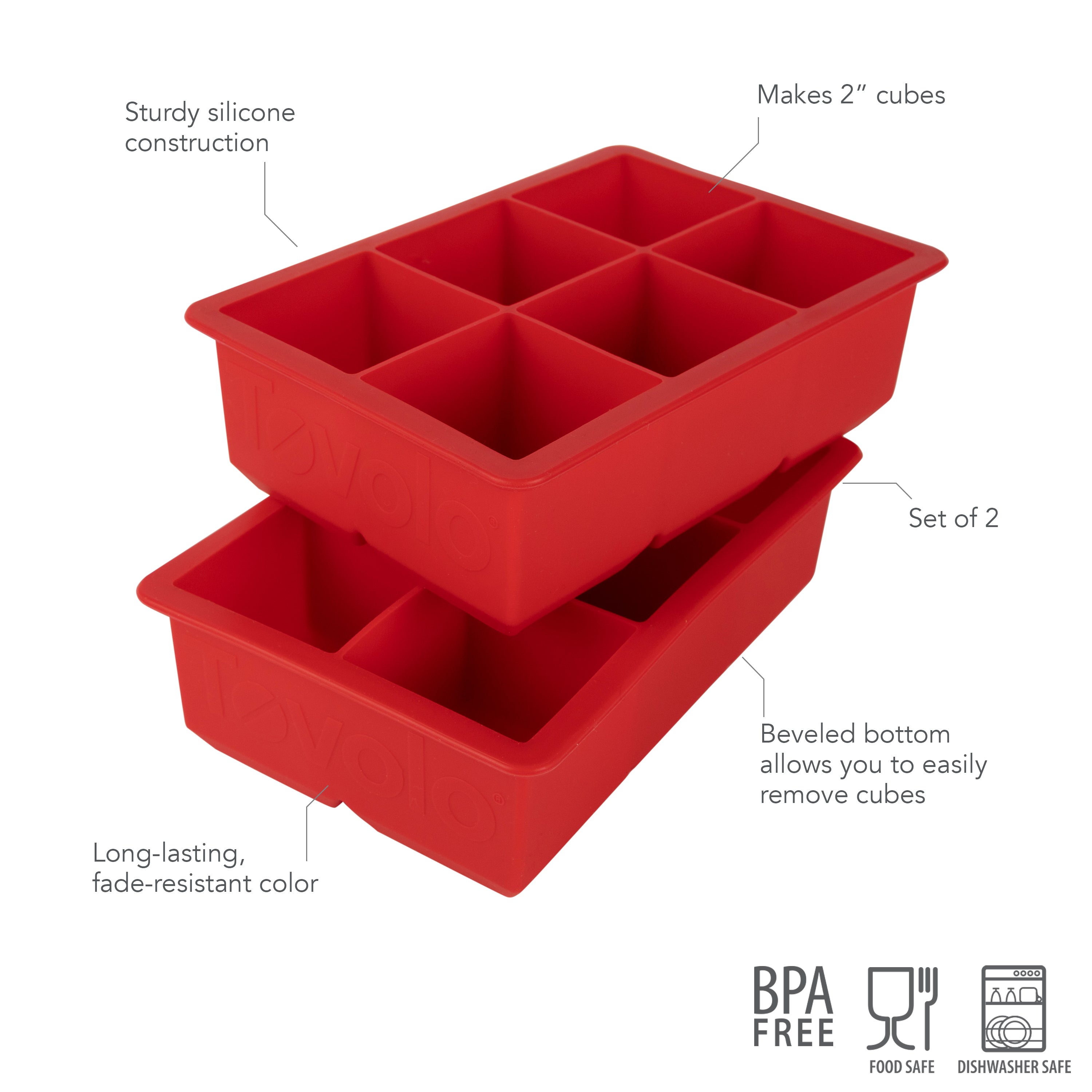 The tovolo King Cube Silicone Ice Molds (Set of 2) feature six compartments per tray for 2-inch craft ice cubes. Made from sturdy, BPA-free silicone, they're food and dishwasher safe with easy-release bevels and durable red color.