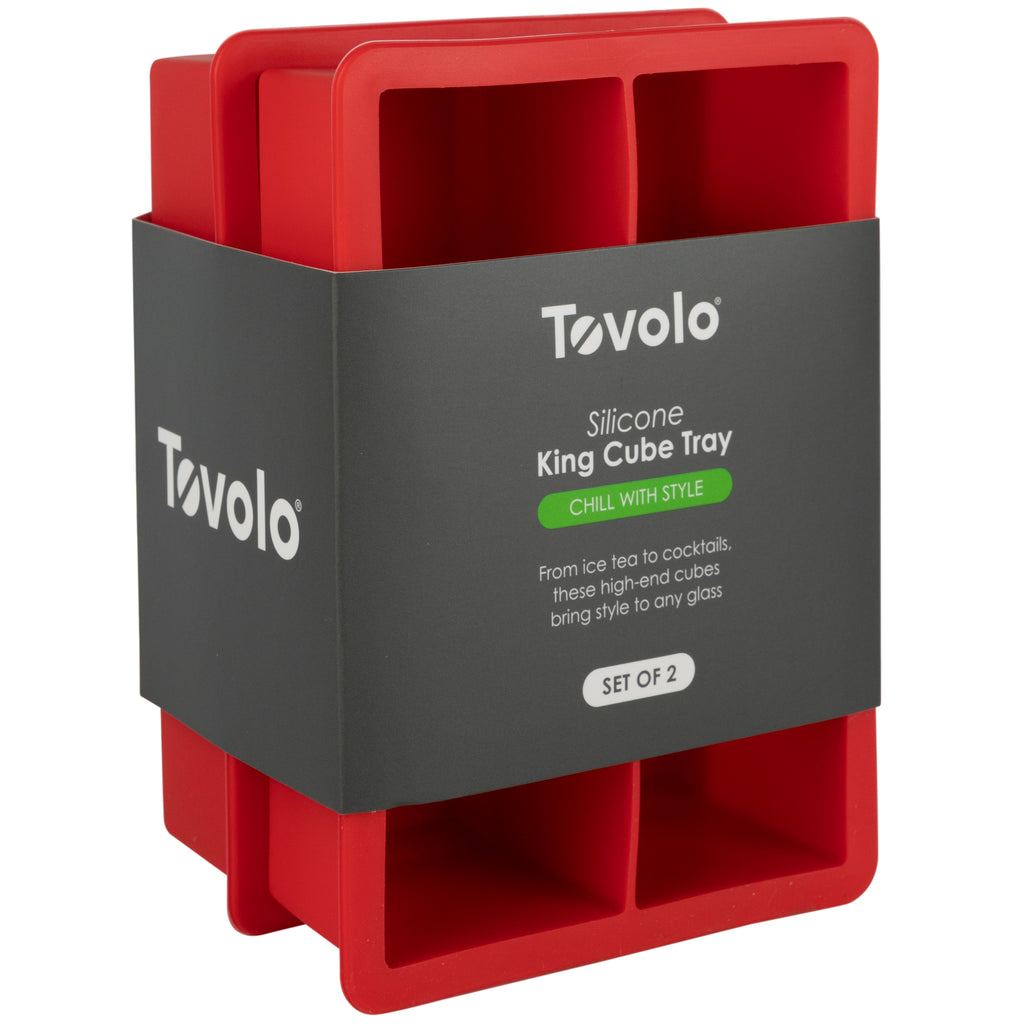 The tovolo King Cube Silicone Ice Molds (Set of 2) feature large square compartments for craft ice, each packaged with a gray sleeve displaying the brand and product details.