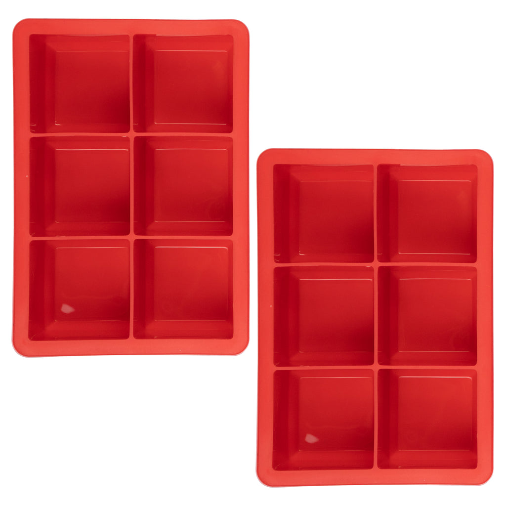 The tovolo King Cube Silicone Ice Molds (Set of 2) feature six large square compartments each, perfect for making craft ice cubes. The red trays are set against a white background, ideal for creating large ice cubes at home.
