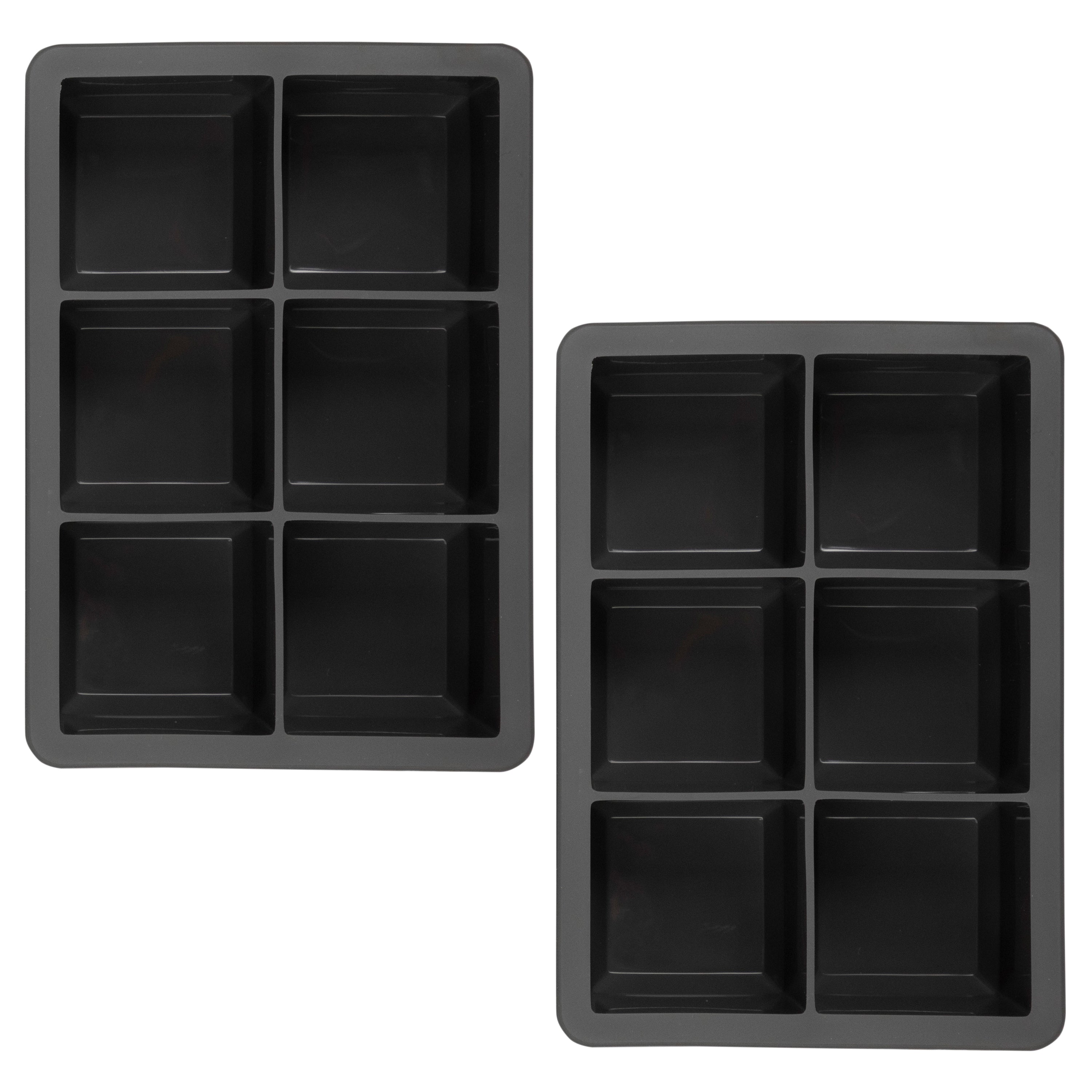 The tovolo King Cube Silicone Ice Molds (Set of 2) feature black trays, each with six large square compartments for craft ice, shown against a white background.
