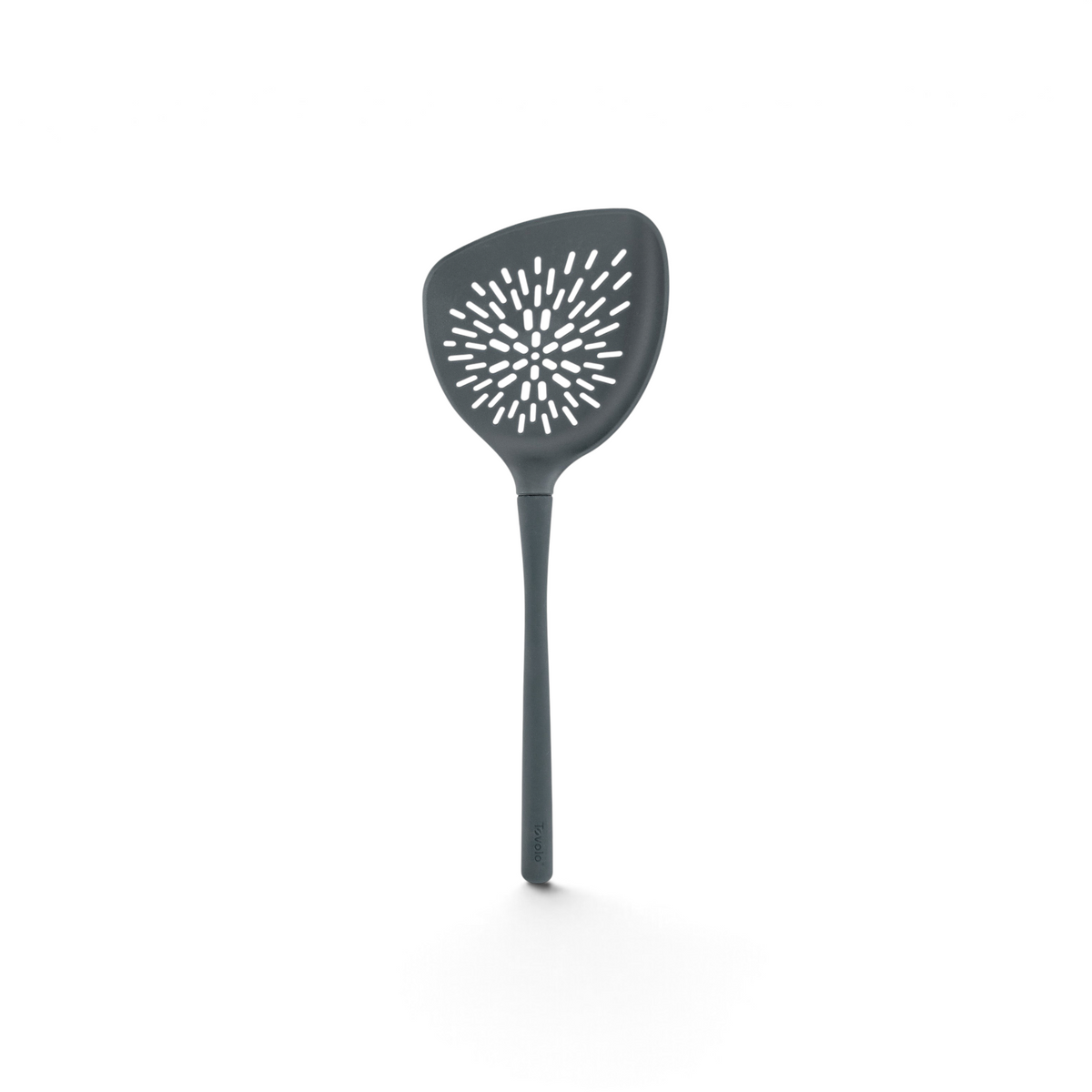 The Roasted Veggie Tool is a gray turner with a long handle and wide triangular head, featuring starburst holes for draining—ideal for serving roasted vegetables.