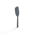 The Flipping Flex Turner features a gray silicone, rounded flexible blade and a straight, sturdy steel handle, shown on a white background—ideal for use with nonstick cookware.