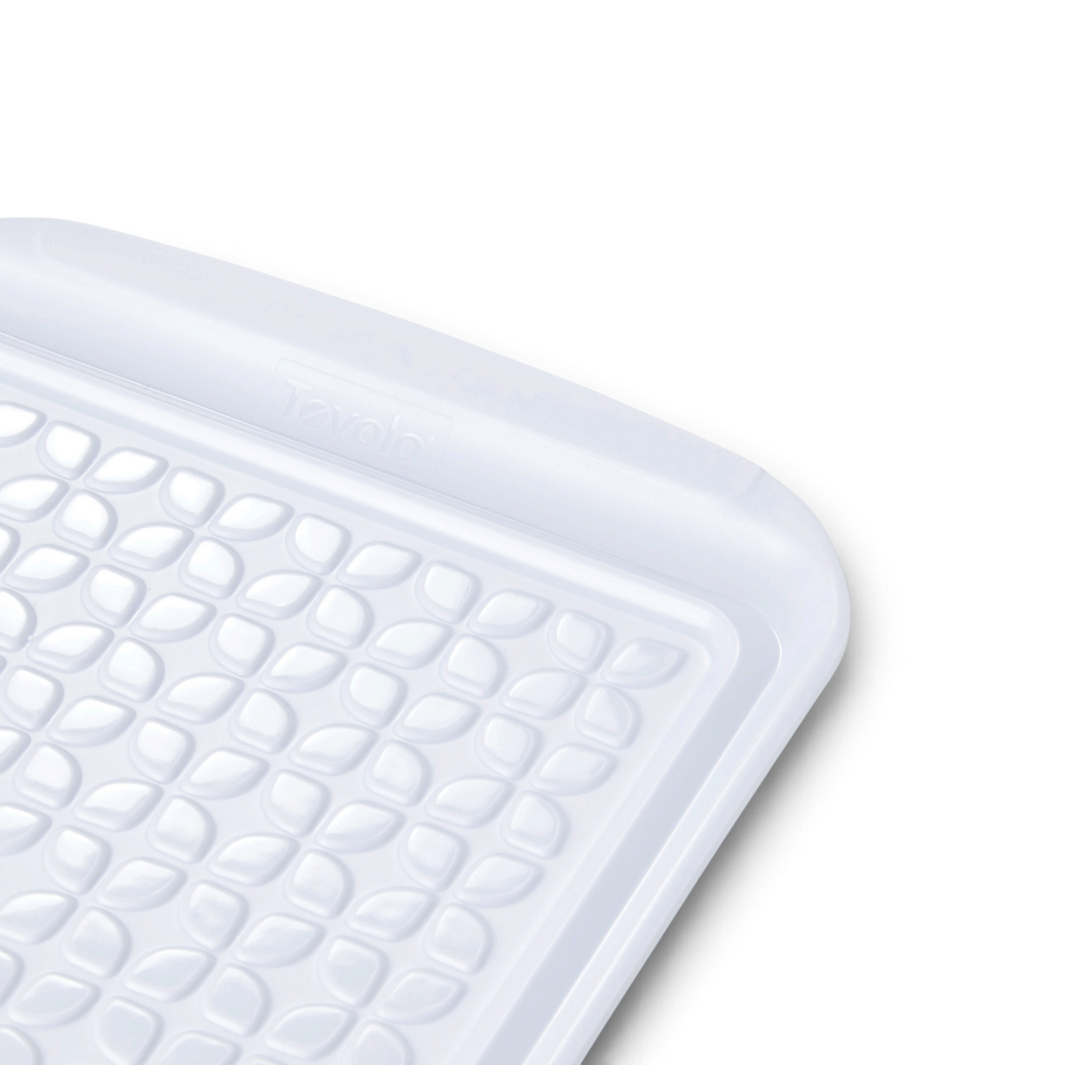 Close-up of the Prep and Serve BBQ Tray, featuring a white plastic build, raised repeating leaf pattern, slightly curved edges, and a smooth rim—ideal for grill masters to prep and serve food while preventing cross-contamination.