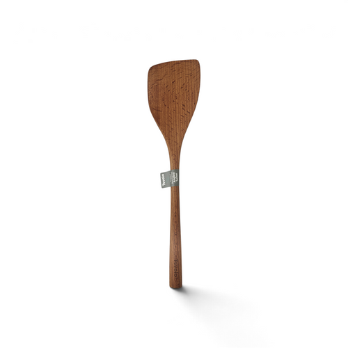 The Beechwood Utensils pancake turner features a flat, wide head and long handle, perfect for non-stick cookware. A small gray label around the neck highlights its smooth finish and visible wood grain.