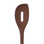 The Beechwood Utensils feature a wooden slotted cooking spoon with an oval hole in the flat, rounded head—ideal for use with non-stick cookware.