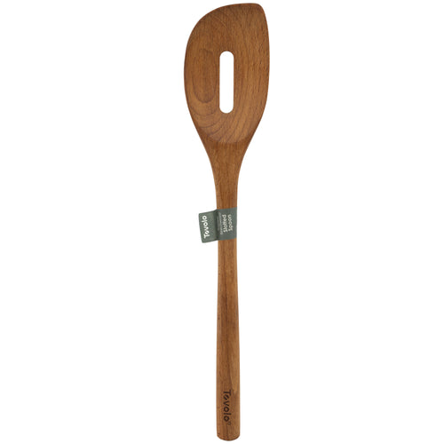 The Beechwood Utensils wooden slotted spoon features a long handle, an oval hole in the head—perfect for non-stick cookware—and a small green and white label at the neck.