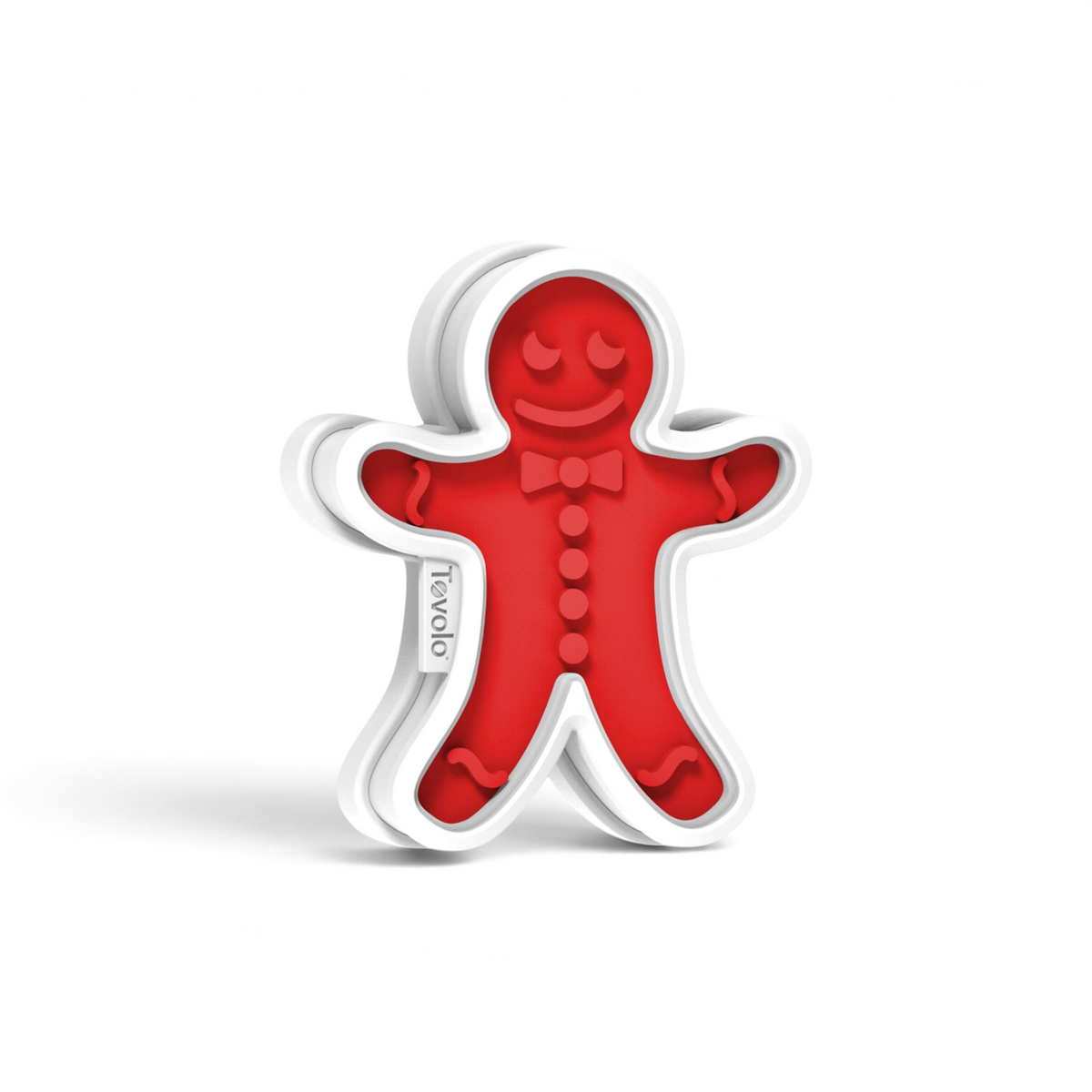The Gingerbread Cookie Cutters feature a red design with white edges, a smiling face, bow tie, and button details—ideal for Christmas cookies. "Tovolo" is printed on the left side for a festive touch.