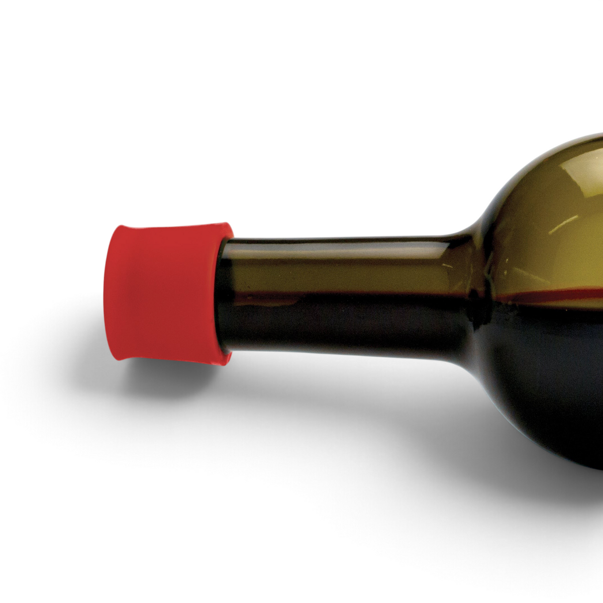 A dark glass bottle rests on its side, sealed with a red Silicone Wine Cap against a plain white background to preserve wine freshness.