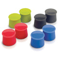 Eight Silicone Wine Caps, shaped like cups in pairs of green, black, red, and blue, are displayed on a white background to help keep wine fresh.