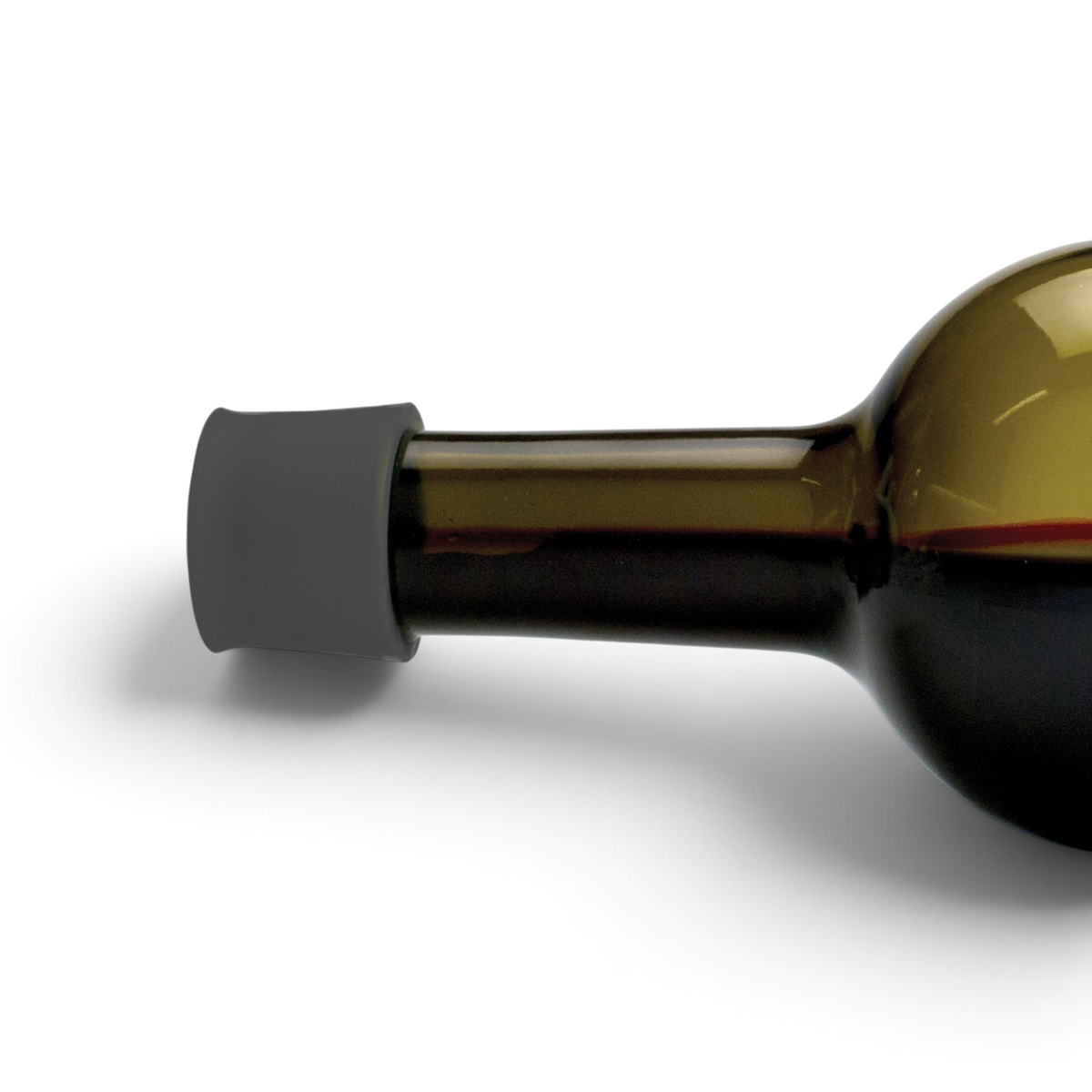A brown glass wine bottle lies on its side with a gray Silicone Wine Cap sealing the opening to keep wine fresh, set against a plain white background.