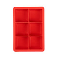 The King Cube Ice Mold is a red silicone tray with six rectangular compartments, arranged in two columns and three rows, perfect for making large ice cubes. It’s shown from a top-down view on a white background.