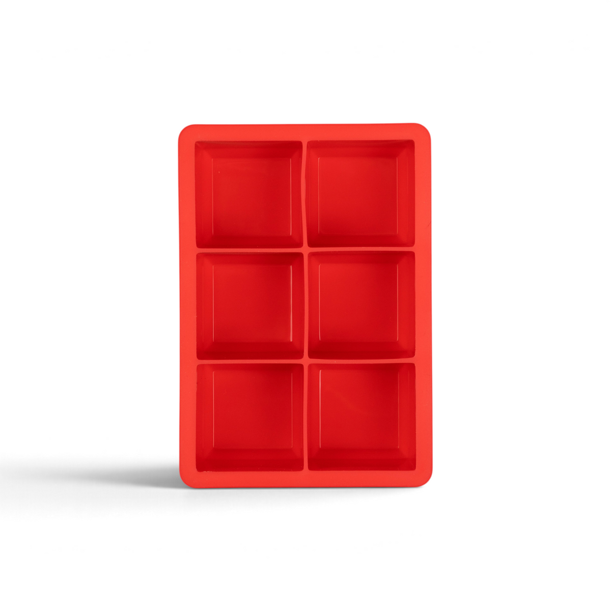 The tovolo King Cube Silicone Ice Mold, featuring six large square cavities in a two-by-three layout, sits against a white background—perfect for crafting big ice cubes.
