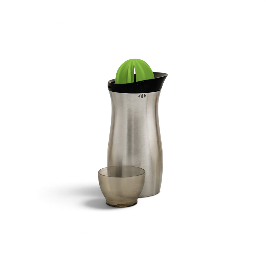 A stainless steel Cocktail Shaker with a green built-in reamer on top and a matching translucent cup beside it, both on a white background—ideal for mixing professional quality cocktails at home.