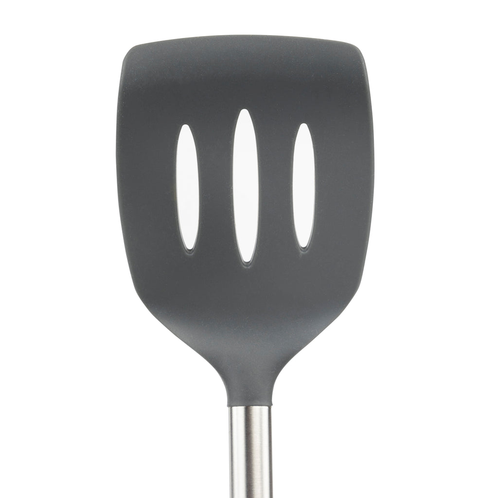 A close-up of the tovolo Silicone and Stainless Steel Slotted Turner with three vertical slots and a stainless steel handle, displayed against a plain white background.