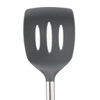 A close-up of the tovolo Silicone and Stainless Steel Slotted Turner with three vertical slots and a stainless steel handle, displayed against a plain white background.
